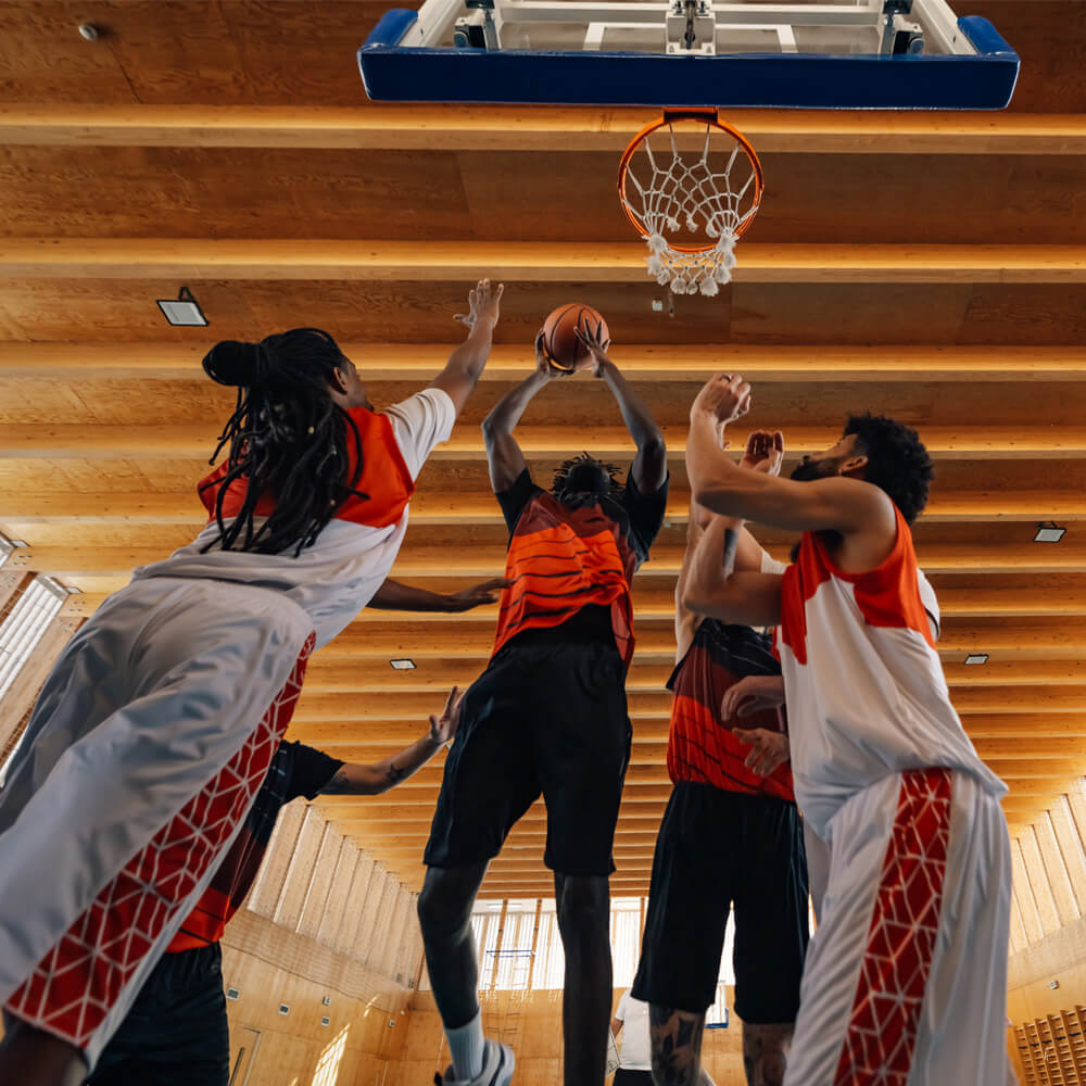 Players attacking the rim